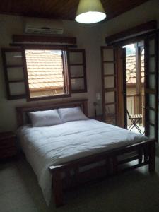 Postel nebo postele na pokoji v ubytování Maritsa Lodge