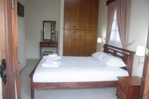 Postel nebo postele na pokoji v ubytování Maritsa Lodge