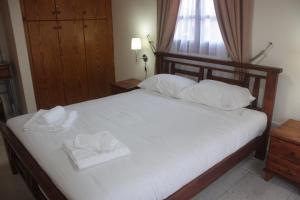 Postel nebo postele na pokoji v ubytování Maritsa Lodge