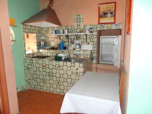 Kuchyň nebo kuchyňský kout v ubytování Casa Bertha