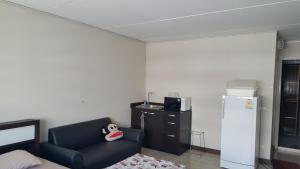 Kuchyň nebo kuchyňský kout v ubytování Popular Condo by Jintana