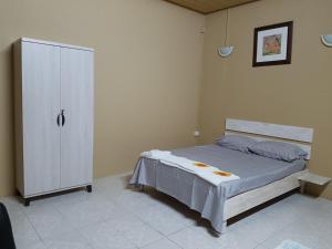 Кровать или кровати в номере JN sunflower residence