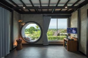 TV a/nebo společenská místnost v ubytování Vino Neste Private Pool Villas