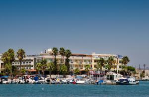 a group of boats are docked in a marina at Kosta Palace in Kos Town