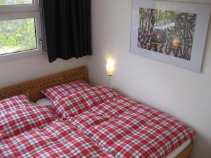 เตียงในห้องที่ Ferienwohnungen Familie Böckmann