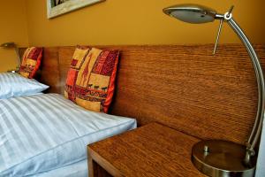 Posteľ alebo postele v izbe v ubytovaní Afrika Hotel Frýdek-Místek