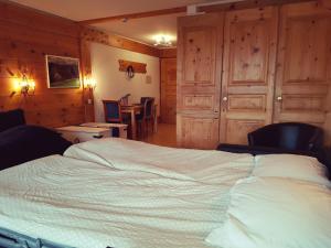 Postel nebo postele na pokoji v ubytování Appartement - Bristol Hôtel + 8 fotografií