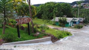 グラマドにあるSossego da Casa Vermelhaの家の前の看板