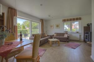 Et opholdsområde på Ferienwohnungen Amrumbank