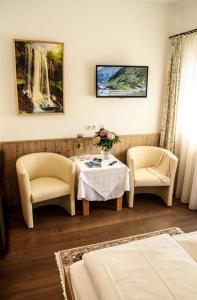 Postel nebo postele na pokoji v ubytování PEOPLE'S Hotel