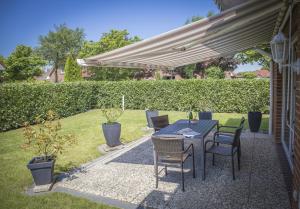 En have udenfor Ferienwohnungen Amrumbank