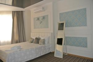 Postel nebo postele na pokoji v ubytování Mini Hotel on Poznyaky