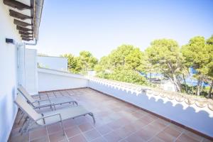 Un balcón o terraza en Villa Cala Padri