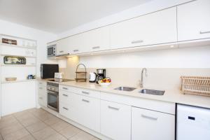 Una cocina o kitchenette en Villa Cala Padri