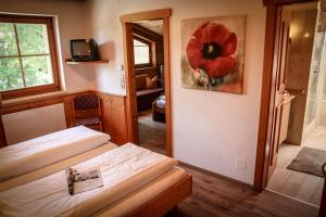 Postel nebo postele na pokoji v ubytování PEOPLE'S Hotel