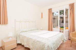 Postel nebo postele na pokoji v ubytování El Pinar + 36 fotografií