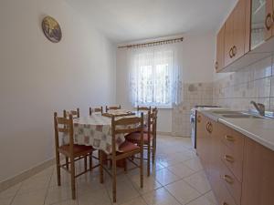 Kuchyň nebo kuchyňský kout v ubytování Apartments Antonio