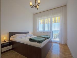 Postel nebo postele na pokoji v ubytování Apartments Antonio