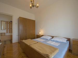 Postel nebo postele na pokoji v ubytování Apartments Antonio