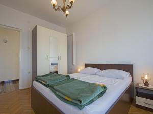 Postel nebo postele na pokoji v ubytování Apartments Antonio