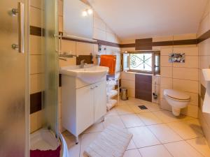 Kúpeľňa v ubytovaní Apartments SOBOL