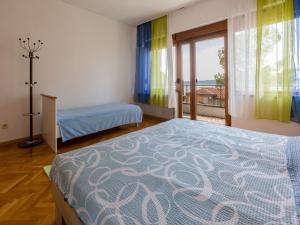 Posteľ alebo postele v izbe v ubytovaní Apartments SOBOL