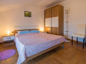 Posteľ alebo postele v izbe v ubytovaní Apartments SOBOL