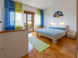 Posteľ alebo postele v izbe v ubytovaní Apartments SOBOL + 37 fotografií