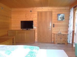 TV a/nebo společenská místnost v ubytování Haus Mittergries