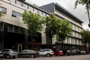 a parking lot in front of a building at BEST BALTIC Kaunas in Kaunas