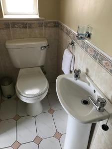 Bagno di Derreen Tighue House