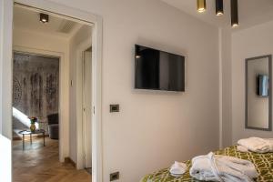 Postel nebo postele na pokoji v ubytování Navona Essence Hotel
