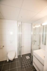 Ett badrum på Stavanger Housing Hotel