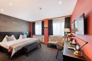 Postel nebo postele na pokoji v ubytování Hotel City Zürich Design & Lifestyle