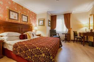 Postel nebo postele na pokoji v ubytování Gordion Hotel - Special Class