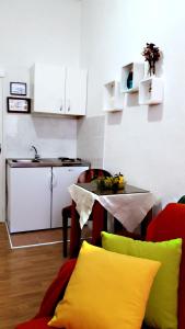 Kuchyň nebo kuchyňský kout v ubytování Apartment Mimmy