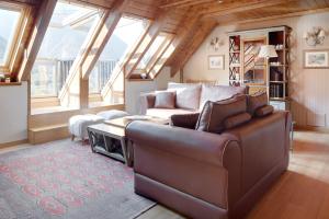 a living room with a couch and a table at Prat de Gessa by FeelFree Rentals in Baqueira-Beret