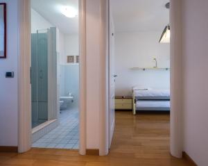 Postel nebo postele na pokoji v ubytování L'ippocampo Guest House