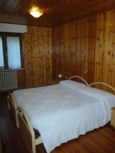 Postel nebo postele na pokoji v ubytování Hotel Fior di Roccia
