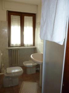 Koupelna v ubytování Hotel Fior di Roccia