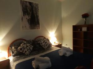 Postel nebo postele na pokoji v ubytování Bed And Breakfast Delle Grotte