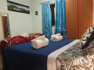 Postel nebo postele na pokoji v ubytování Bed And Breakfast Delle Grotte