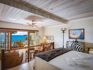 Postel nebo postele na pokoji v ubytování Bequia Beach Hotel - Luxury Boutique Resort