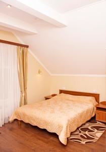 Een bed of bedden in een kamer bij SV Park Hotel
