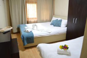 Postel nebo postele na pokoji v ubytování Etno Restoran Ranc