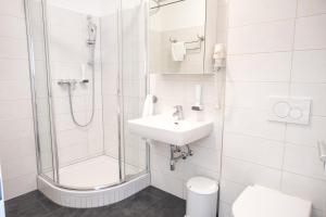 Kúpeľňa v ubytovaní motel22 Parkplatz inklusive + 37 fotografií