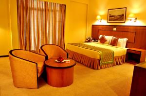 Ramada Katunayakeにあるベッド