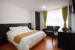 Ένα ή περισσότερα κρεβάτια σε δωμάτιο στο Hotel Palermo Suite