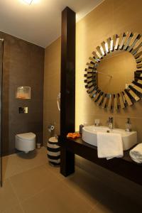 Vonios kambarys apgyvendinimo įstaigoje Hotel Orhideea