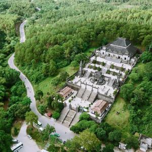 an aerial view of a large house in the forest at Tin Tin Hue Hostel in Hue